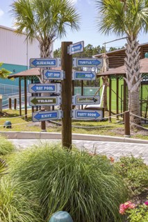 Sign directs guests to different attractions at Ocean Adventures Marine Park in Gulfport,