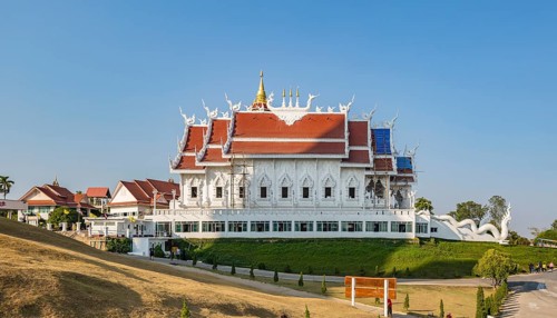 Bamboo scaffolding installed for roof repairs at the Viharn assembly hall at Wat Huay Pla Kang in