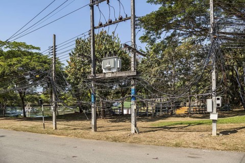 Tangled mess of utility lines on the campus of CRRU Shiangrai Rajabhat University in Chiang Rai,