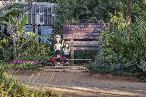 Sign near entrance of the Union of Hill Tribe Villages representing the Akha, Yao, Lahu, Kayaw, and