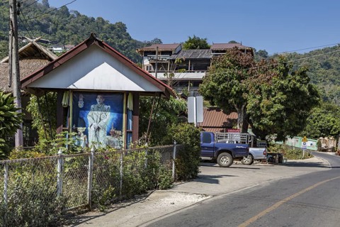 Photo of recent kink in shrine near the entrance to Doi Pha Mee in the hills of the Mae Sai