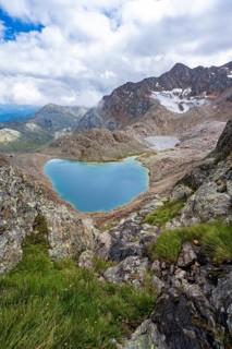 High mountain landscape, view of mountains with mountain lake Vogelhüttensee, Stubai Alps, South