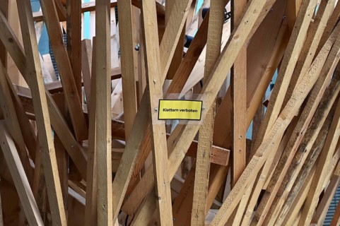 No climbing - sign in an outdoor exhibition at the Futurium on the subject of agriculture and
