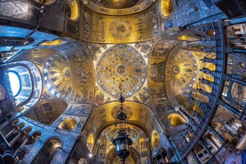 Wide angle view of the richly decorated ceiling of st. Mark's basilica, showcasing its intricate