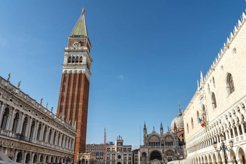Scenic view of piazza san marco with its famous landmarks, including st. Mark's campanile and