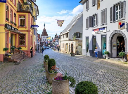 Main street with Königschaffhausener Tor, an old town gate of Endingen am Kaiserstuhl,