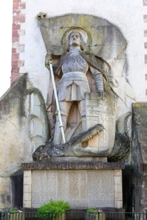 St George the Dragon Slayer with dragon on the exterior façade of St Martin's Church in Endingen am