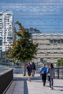 Reflecting facade of the Rabobank building at the central station, Utrecht Centraal, Netherlands