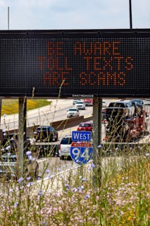 Detroit, Michigan - A message on an electronic road sign on Interstate 94 warns drivers about
