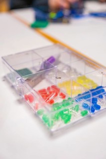 Colourful LEDs and electronic components in a plastic box on a table, Youth Research Centre Nagold,
