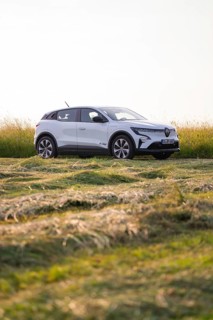 Parked car in a green field landscape, Renault Megane, Deer E Carsharing, electric car, Calw, Black