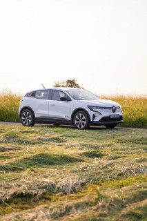 White car on a rural road in Sommerfeld, Renault Megane, Deer E Carsharing, electric car, Calw,