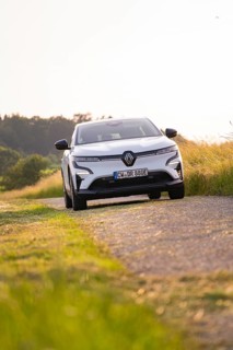 White car driving on a rural road in summer, Renault Megane, Deer E Carsharing, electric car, Calw,