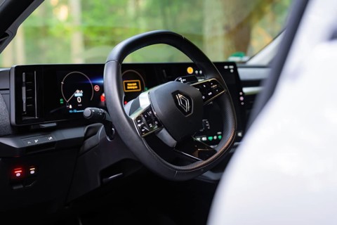 Modern car interior with focus on the steering wheel, Renault Megane, Deer E Carsharing, electric