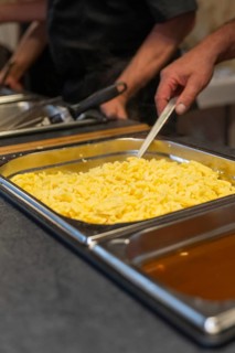 Fresh spaetzle is served in a tray at the buffet, Event and wedding location Kloster Lorch, Lorch,