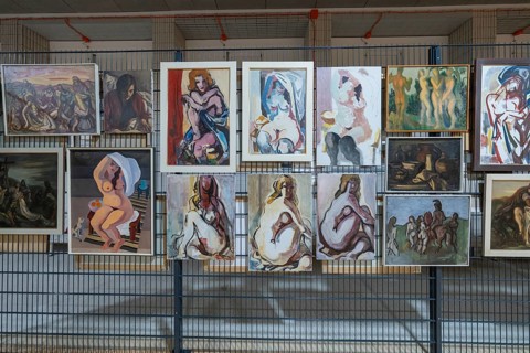Collection of nude paintings in a gallery exhibition, historical art exhibition in the old swimming