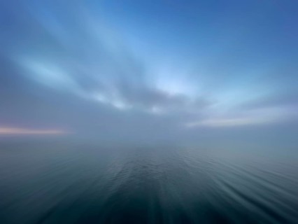 Fog over Lake Starnberg, zoom effect, Bavaria, Germany