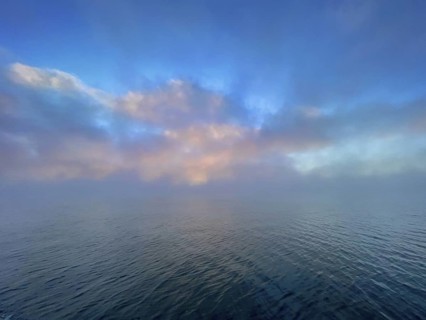 Fog and clouds over Lake Starnberg, Bavaria, Germany