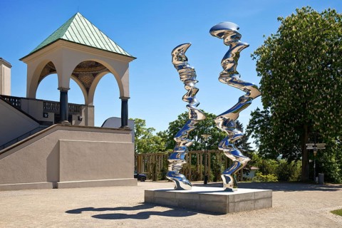 Stainless steel sculpture entitled Points of View by Tony Cragg in front of the exhibition
