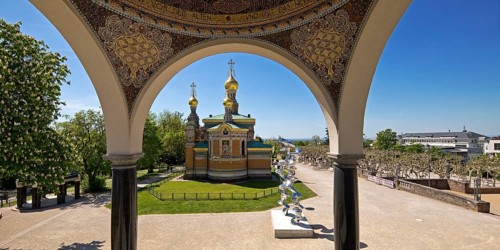 View from the pavilion to the Russian Chapel with the stainless steel sculpture by Tony Cragg,
