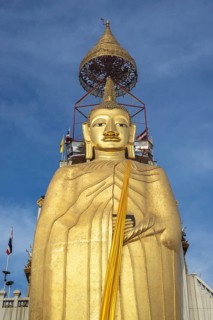 32 metre high standing Buddha decorated with glass mosaics and 24 carat gold, the upper knot of the