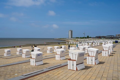 Beach chairs on paved coast, promenade, Büsum, North Sea, Schleswig-Holstein, Germany