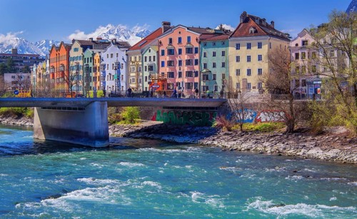 Coloured house front on the banks of the Inn, Innsbruck, Inn Valley, Tyrolean Alps, Tyrol, Austria