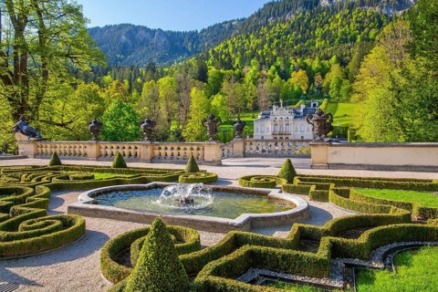 Garden terrace at the Temple of Venus with the portal of Linderhof Castle in spring, municipality