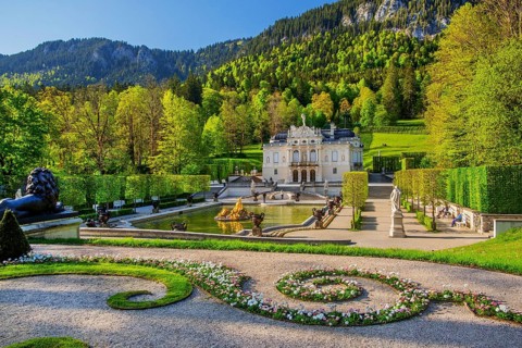 Water parterre with the portal of Linderhof Castle in spring, municipality of Ettal, Ammergau Alps,