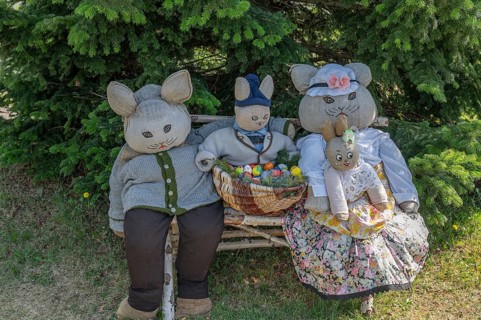 Rabbit family on a bench, Easter decoration in a village in Upper Franconia, Bavaria, Germany