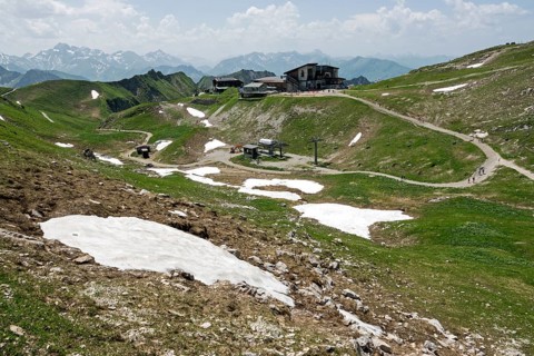 Edmund-Probst-Haus and Höfatsblick mountain station of the Nebelhornbahn, behind mountains of the