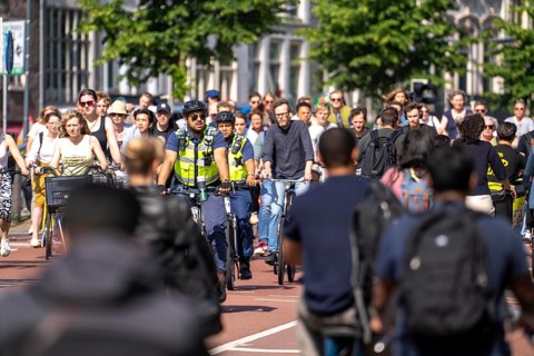 Central cycle path on the Vredenburg, in the city centre of Utrecht, lanes for pedestrians,