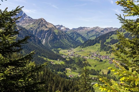 Alpine valleys with the villages of Mittelberg, Hirschegg and Riezlern amidst the surrounding