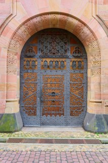 Archbishop's Ordinariate door, ornate historic door under an embossed round arch, Freiburg im