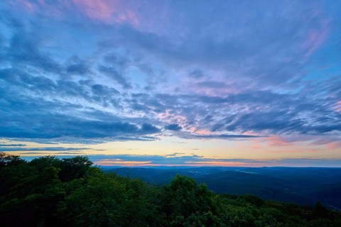 Twilight sky with purple and blue clouds over the landscape, Katzenbuckel, Waldbrunn,