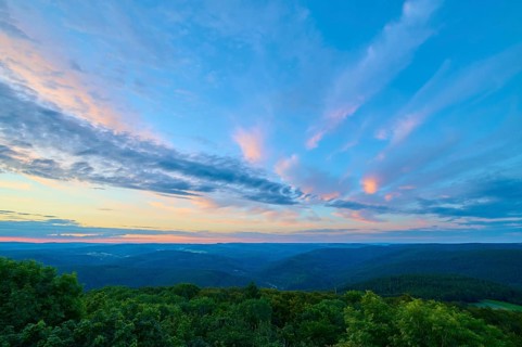 Evening light over a green landscape, Katzenbuckel, Waldbrunn, Neckar-Odenwald-Kreis, Odenwald,