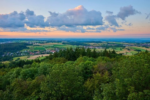 View of a wide landscape with forests, fields, sunrise, Katzenbuckel, Waldbrunn,