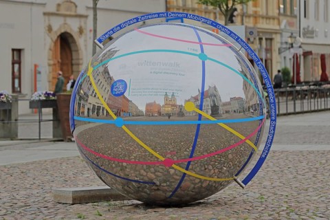 Metal ball with reflection and inscription Note to link digital mobile device, smartphone,