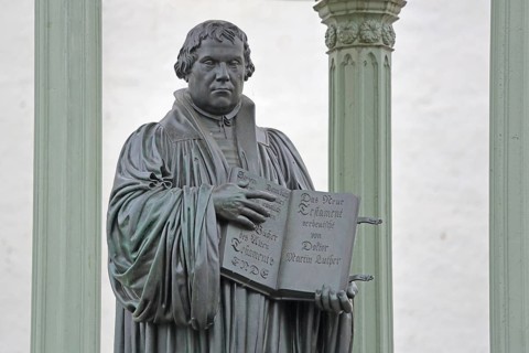 Luther monument with Bible and New Testament, Martin Luther, inscription, hands, carry, open, open,