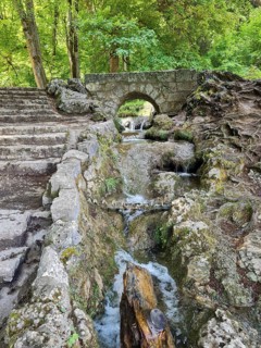 A small stone bridge over the Brühlbach, wild and romantic stream and source of the Urach waterfall