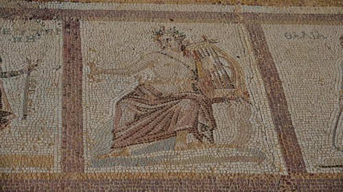 Ancient mosaic of a seated figure with lute, mythological impression, Archaeological Site, Western