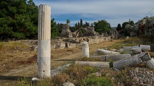 Roman or Greek ruins with scattered ancient columns in a landscape, Hall of Columns Xysto,