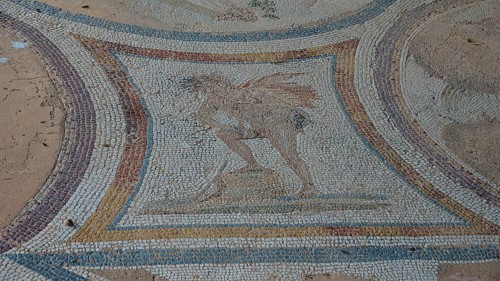 Ancient mosaic with a winged figure, artistically designed, Archaeological Site, Western