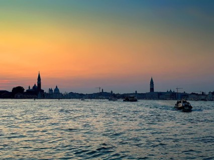 View over the lagoon to Venice at sunset, lagoon city of Venice, Veneto, Italy