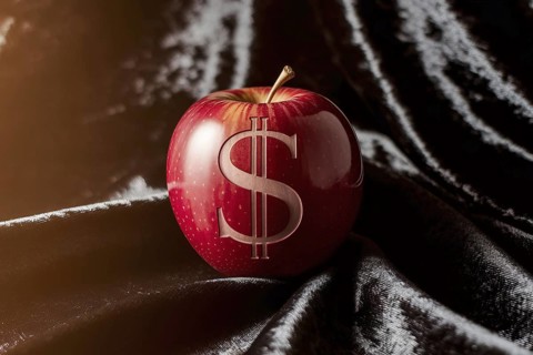 Carved dollar sign on apple. A symbol of rising food costs and economic pressure. Generative ai, AI