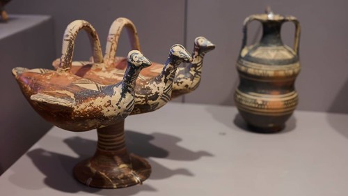 Ceramic vessel with triple bird's head design, artistically decorated, Archaeological Museum, Kos