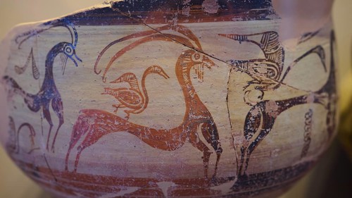 Antique vase with geometric art motifs of goats and birds in red and beige, Archaeological Museum,