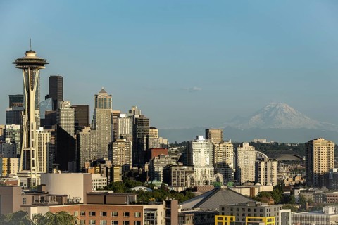 Seattle skyline at golden hour with Mt Rainier in the background, Washington, USA, North America