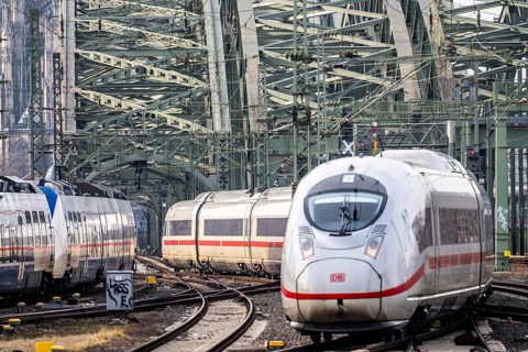 Rail track in front of Cologne Central Station, Hohenzollern Bridge across the Rhine, ICE