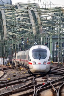 Rail track in front of Cologne Central Station, Hohenzollern Bridge across the Rhine, ICE